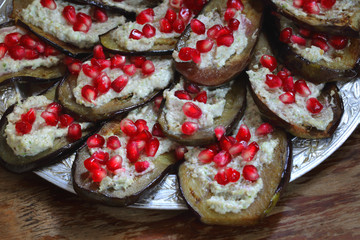 Still life with a guitar, figs and notes on a brown background