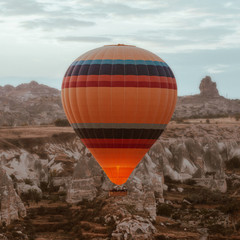 Hot air balloon flying over Cappadocia dawn © kucherav