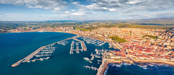 View from flying drone. Panoramic spring cityscape of Alghero port, Province of Sassari, Italy,...
