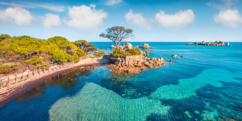 View from flying drone. Stunning spring view of Tamaricciu beach. Aerial morning scene of Corsica...