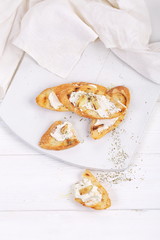French puree soup with parsnip, soft cheese baguette.