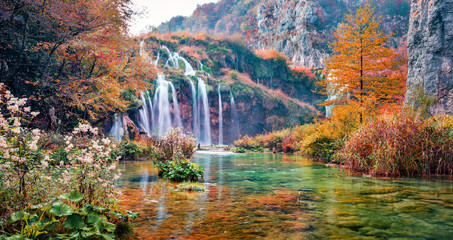 Gorgeous morning view of pure water waterfall in Plitvice National Park. Stunning autumn afternoon...