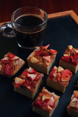 Fruit cake with cup of black coffee