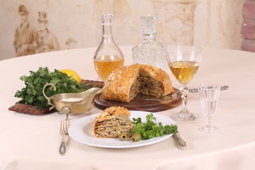 puff pastry pie with chicken and mushrooms and the brandy in the glass © Pretti