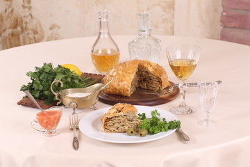 puff pastry pie with chicken and mushrooms and the brandy in the glass © Pretti