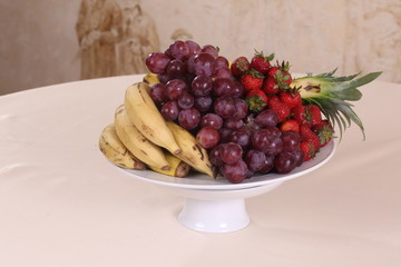 Fruit plate on black background