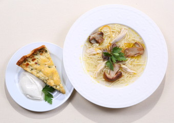 Mushroom soup on white wooden table