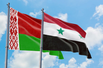 Syria and Belarus flags waving in the wind against white cloudy blue sky together. Diplomacy...