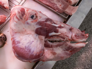 fresh pig pork skinned head meat in the market