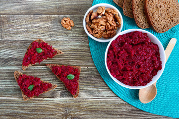Beetroot caviar. Simple, tasty and healthy vegetable snack. Sliced rye bread with beetroot caviar. Lenten menu. Top view.