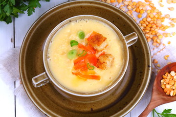 Pea porridge on a wooden table