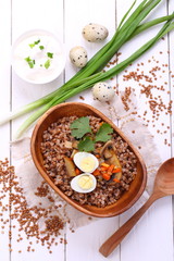 Porridge with mushrooms and quail eggs