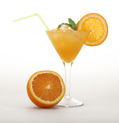 Glass of screwdriver for a cocktail on a white isolated background