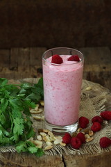 Smoothie made from ripe kiwi in a transparent jar and smoothies
