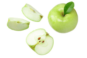 green apples with slices isolated on white background. top view