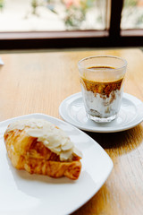 Glass of Nitro Cold Brew Coffee on wood  Table in Coffee Shop, Fresh Drink Compost