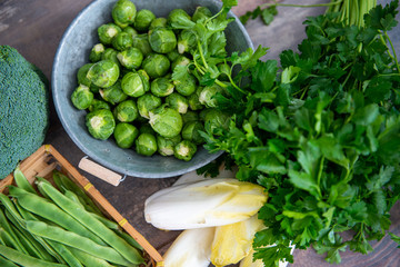 sprouts and endives on wooden background, Belgian vegetables