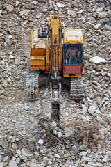 Obraz premium Backhoe Excavator working on construction site