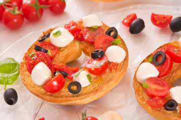 Friselle with tomatoes and mozzarella cheese.