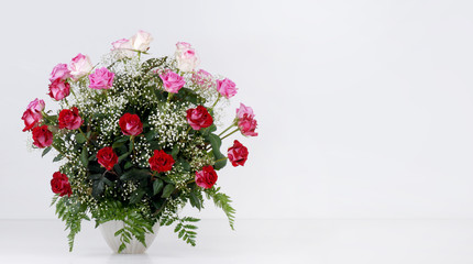 Bouquet of roses isolated on light gray background © Vladimir