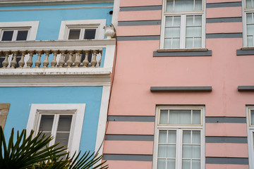 Pastel pink and blue buildings in Lagos, Portugal, in the Algarve region