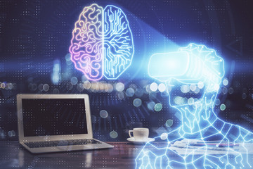 Obraz premium Computer on desktop with AR theme icon. Multi exposure. Concept of augmented reality.
