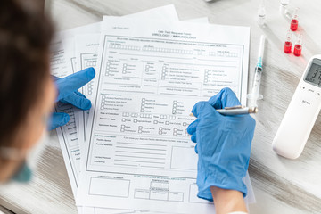 Fototapeta premium Concept Novel coronavirus 2019-nCoV. Lab form virus test. Chinese coronavirus outbreak. MERS-Cov middle East respiratory syndrome coronavirus. Still life of medical instruments n-cov