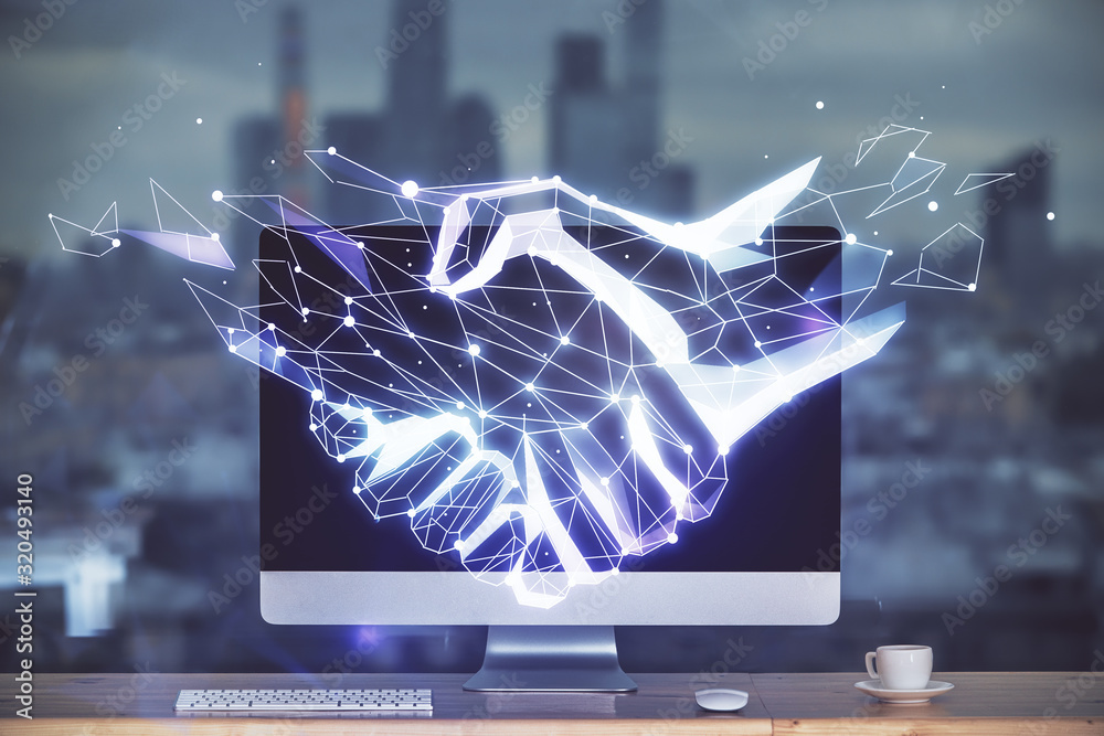 Poster desktop computer background in office and handshake hologram drawing. double exposure. pertnership c