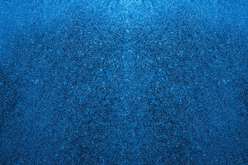 blue color frozen snowflakes winter window background