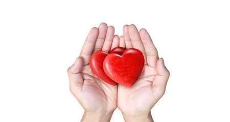 Hands holding red heart, heart health, and donation concepts