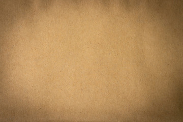 Brown paper, craft abstract background. Retro, old antique vintage paper art pattern texture background. Detail paperboard texture of pattern with free space copy for text, vignette effect.