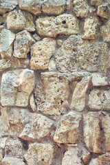 The texture of the old wall of boulder, the background surface of large stones