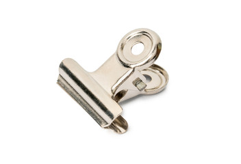 Metal bulldog clip isolated on white background with clipping path.