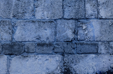 Stone wall with large blocks of blue color