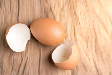 Eggshell and chicken eggs on the ground, brown banana leaves in the studio.Boiled eggs are a food for everyone's health.