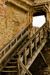 Obraz premium Wooden staircase of an old castle, handmade