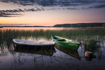 Obraz premium Boats over the Lasmiady lake near Elk, Masuria, Poland