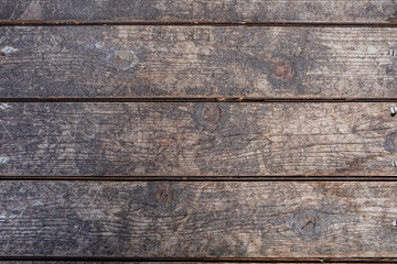 Grungy wooden board for background usage. Old hard wood plank wall background. Old natural wooden...