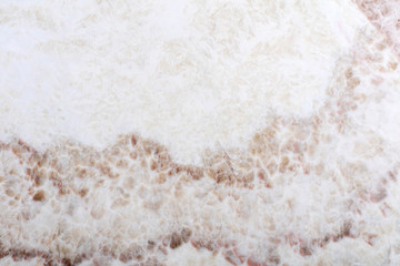 Expensive onice background in light color for your personal interior. High quality texture.
