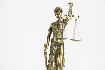 Fototapeta premium Statue of justice. Law and justice concept. White background with copy space.