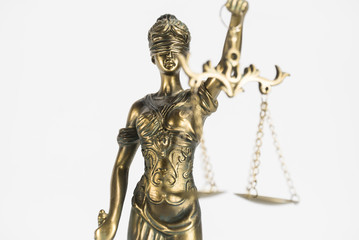 Statue of justice. Law and justice concept. White background with copy space.