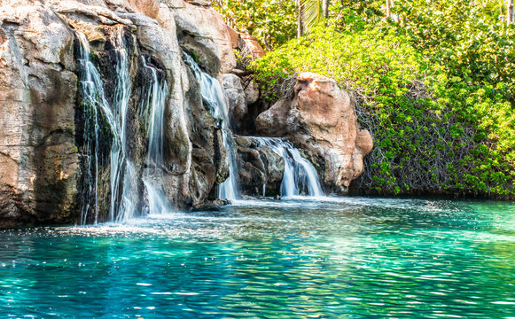 Beautiful Waterfall On Rocks Landscape.