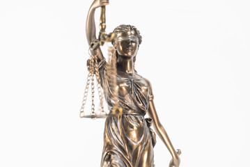 Statue of justice. Law and justice concept. White background with copy space.
