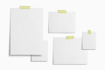 Moodboard template composition with blank photo cards, torn paper, polaroid frame glued with yellow adhesive tape and isolated on white for easy editing.