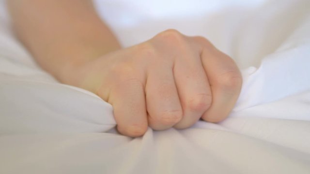 Woman Hand With Sex Orgasm On White Bed in 4K Slow motion 60fps