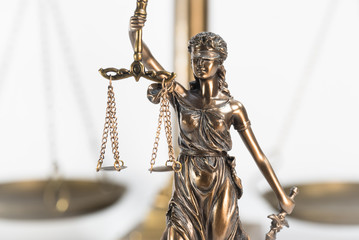 Statue of justice. Law and justice concept. White background with copy space.