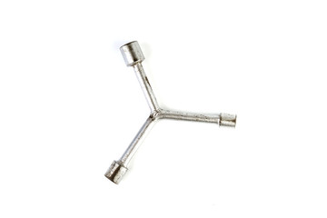 Three way wrench isolated on white background