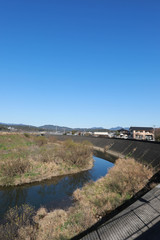 Fototapeta premium canal beside the road at Japan