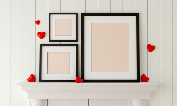 Three Black picture frame placed on the fireplace in white room with mini red heart. Valentine sweet concept.