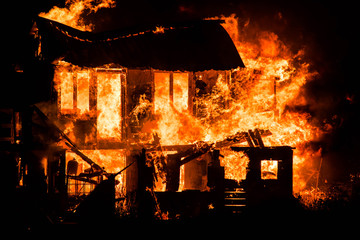 spectacular house fire at night - 320511558